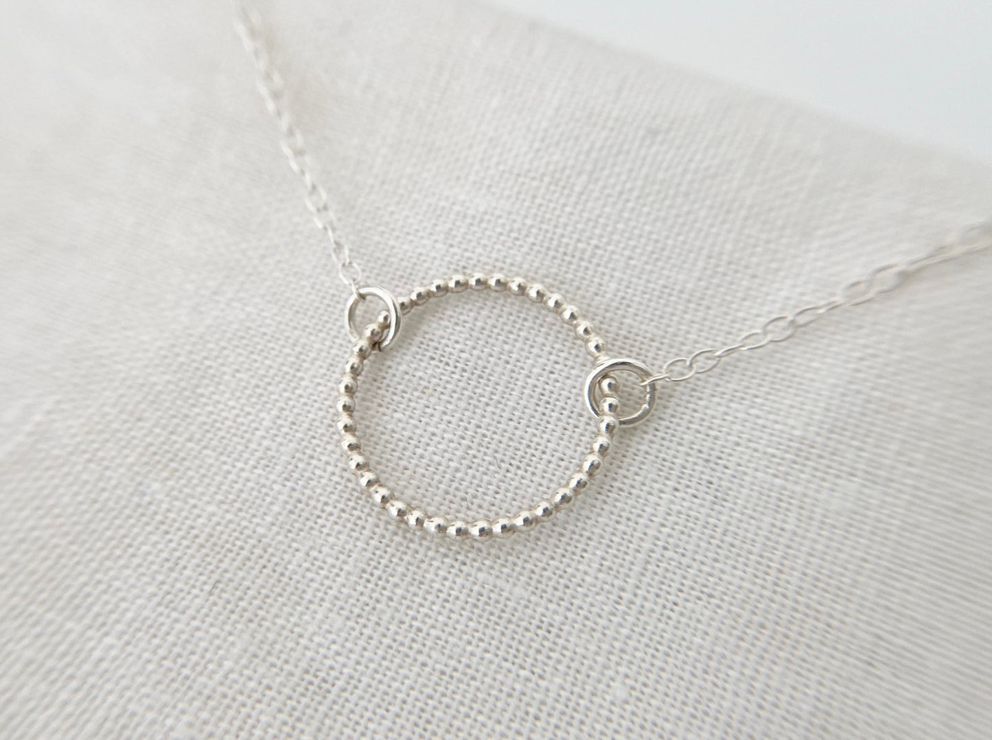 Sterling Silver Circle Necklace with Bead Effect