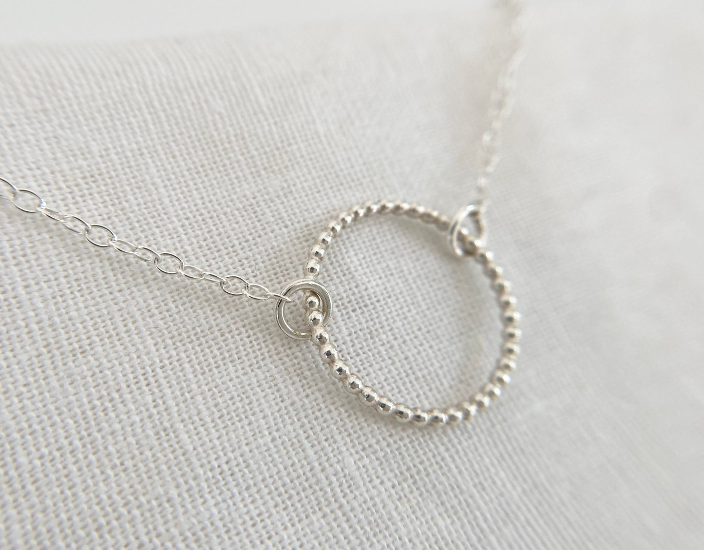 Sterling Silver Circle Necklace with Bead Effect