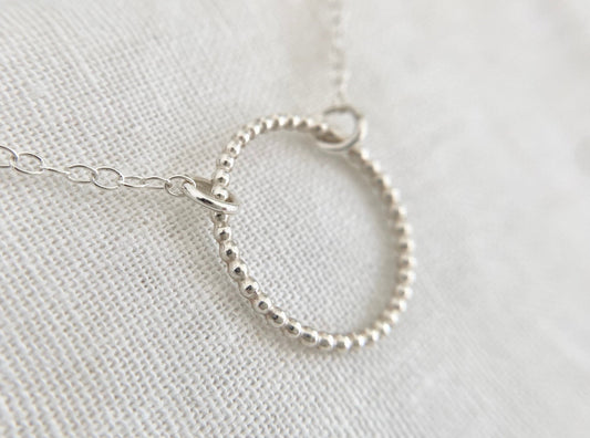 Sterling Silver Circle Necklace with Bead Effect