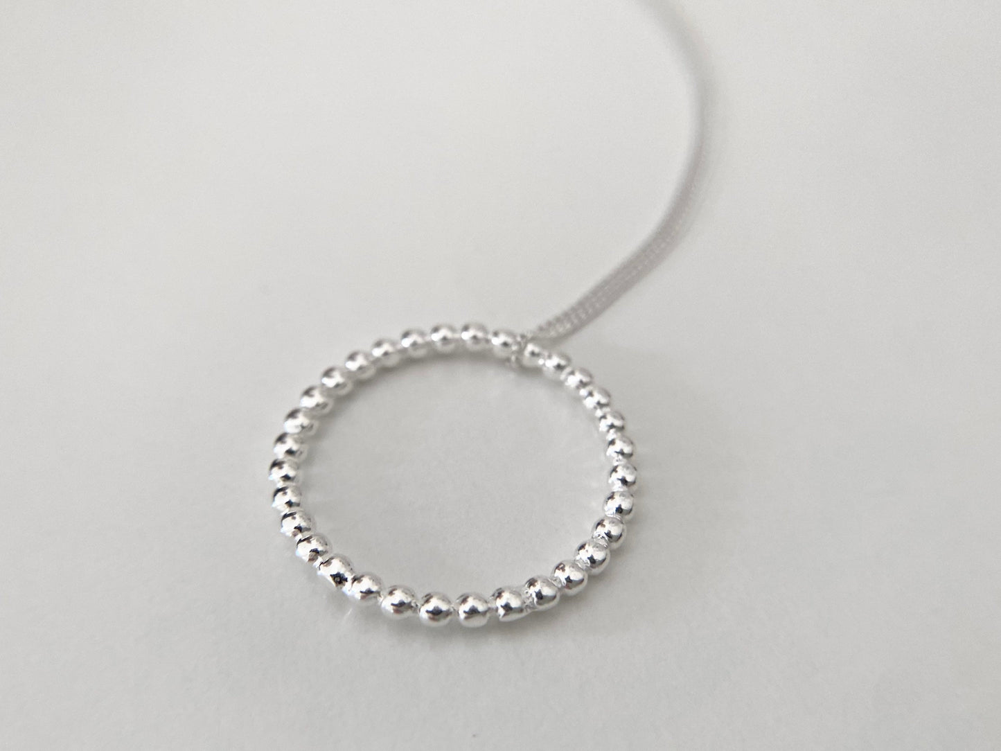 Sterling Silver Circle Necklace with Bead Effect