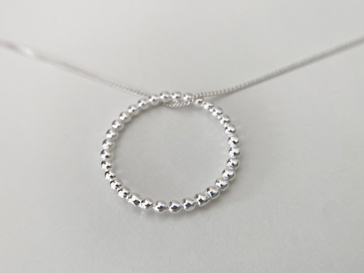 Sterling Silver Circle Necklace with Bead Effect