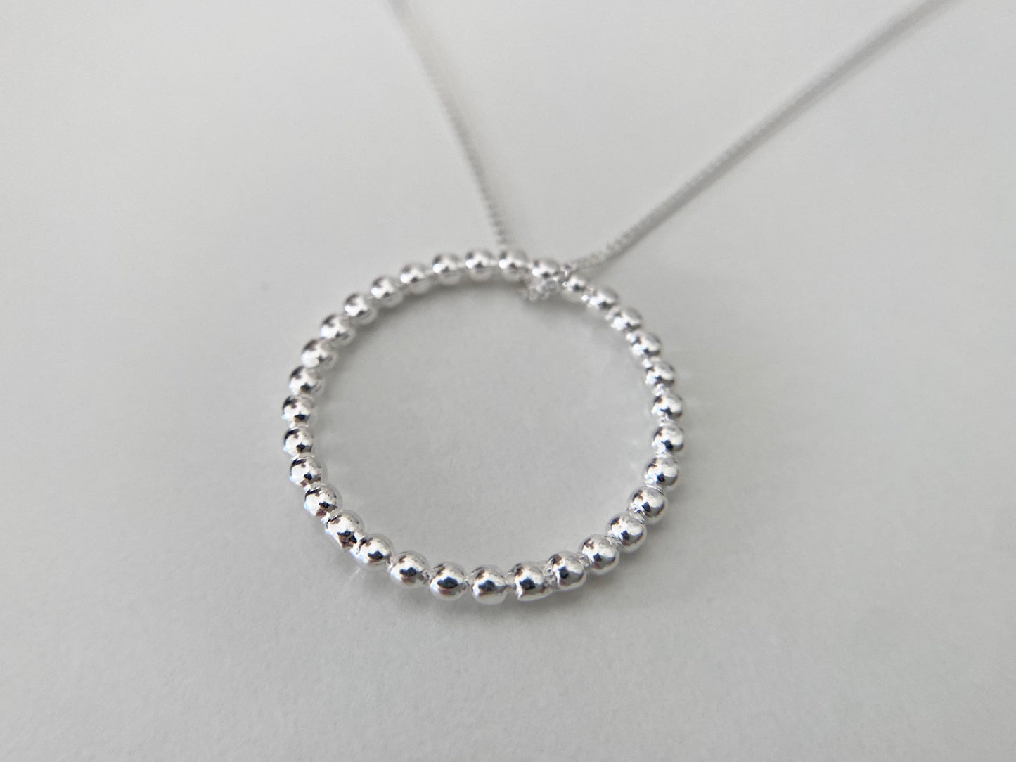 Sterling Silver Circle Necklace with Bead Effect