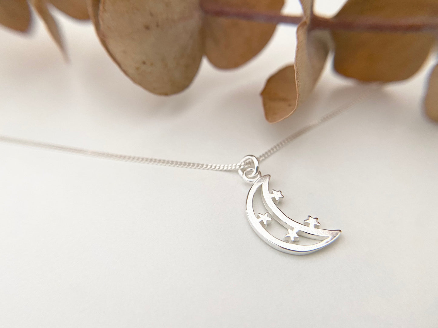 Petite Silver Star & Moon Pendant Necklace