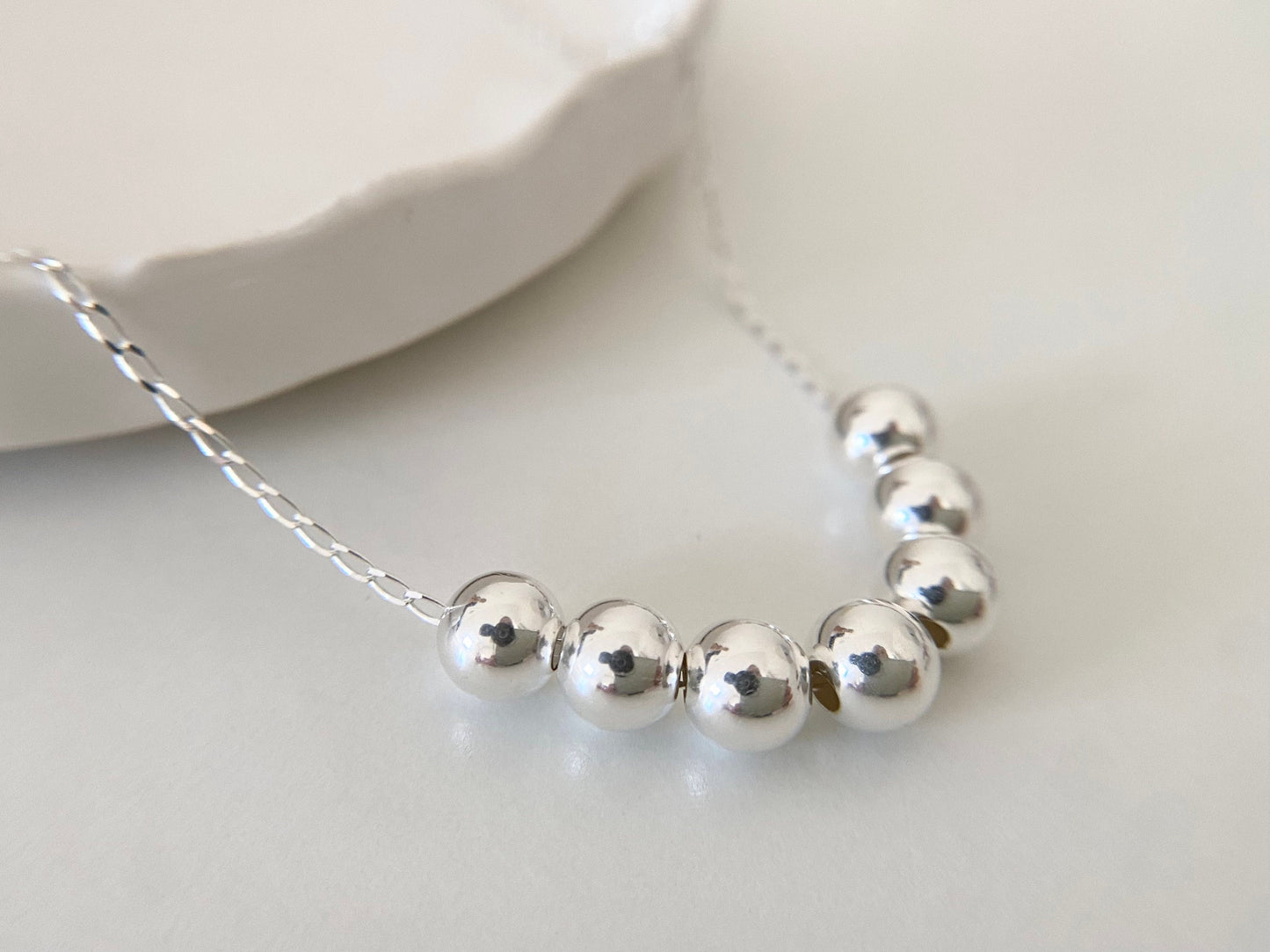 70th Birthday Sterling Silver Necklace for Seven Decades