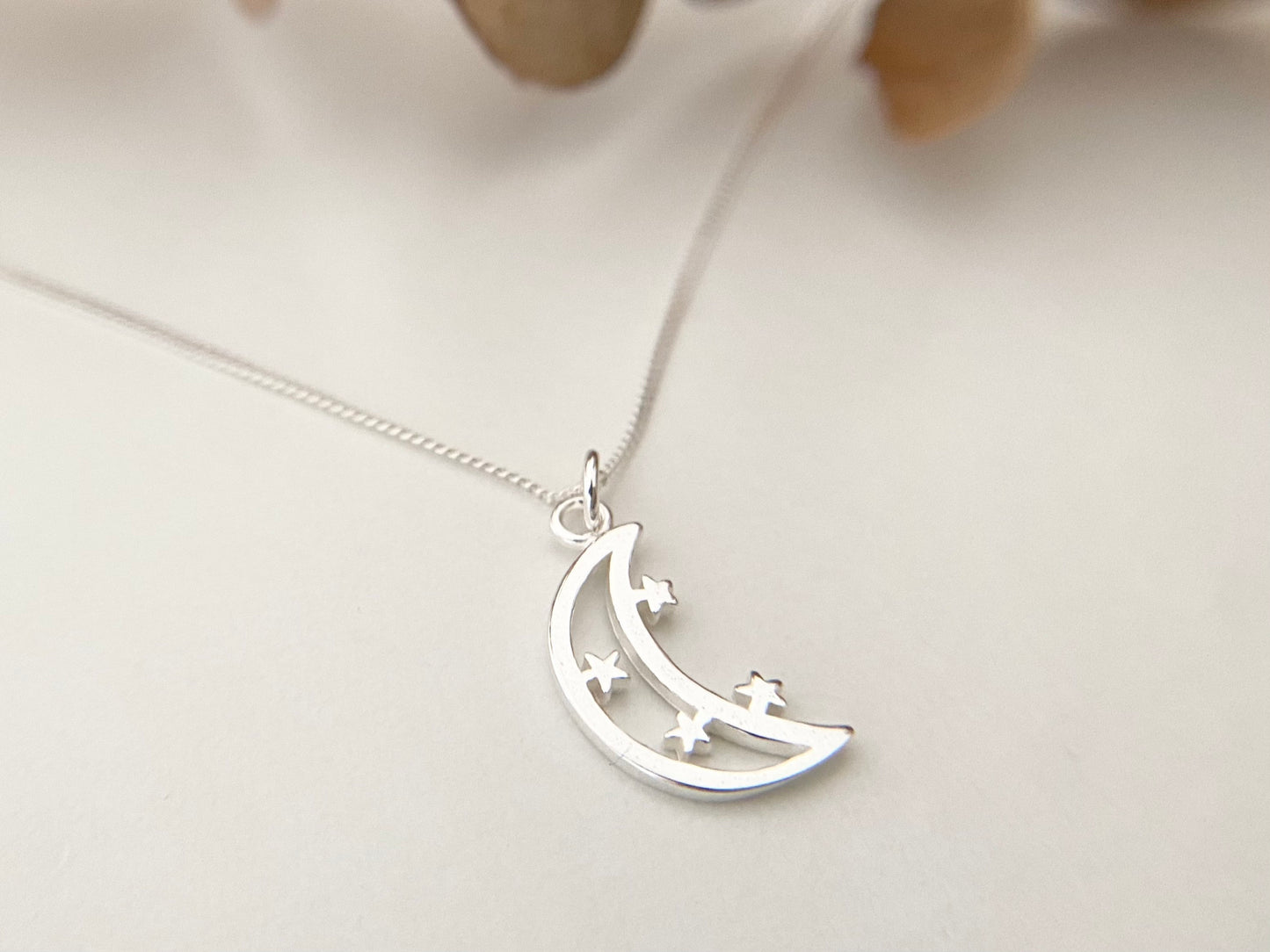 Petite Silver Star & Moon Pendant Necklace